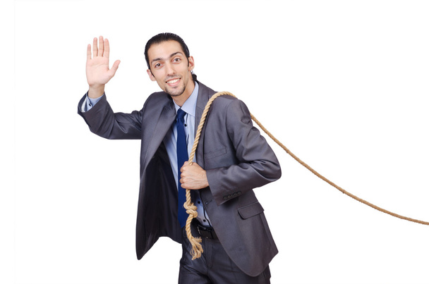 Empresário puxando corda no branco
 - Foto, Imagem