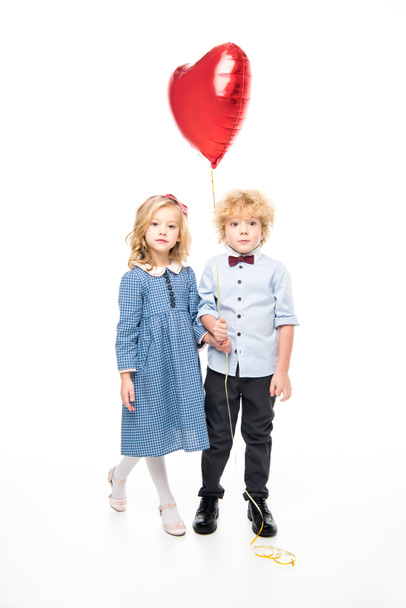 Kids with heart shaped balloon - 写真・画像
