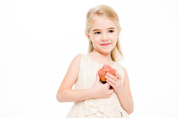 Girl holding cupcake - Fotoğraf, Görsel
