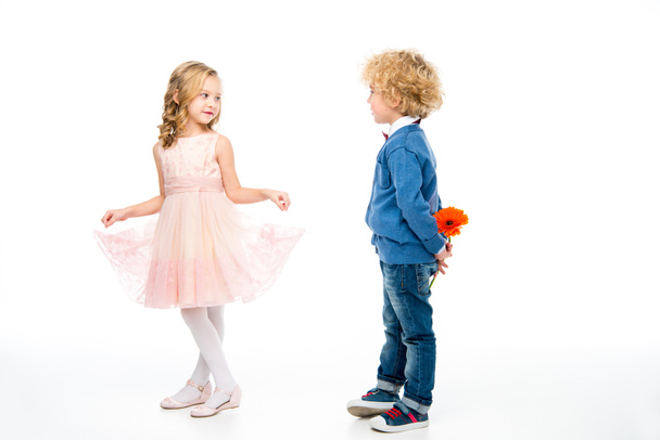 Adorable kids with flower - Foto, afbeelding