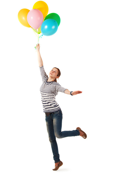 Смішна дівчина-підліток позує з повітряними кулями
 - Фото, зображення