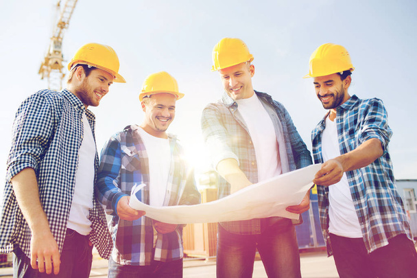 group of builders with tablet pc and blueprint - Photo, Image
