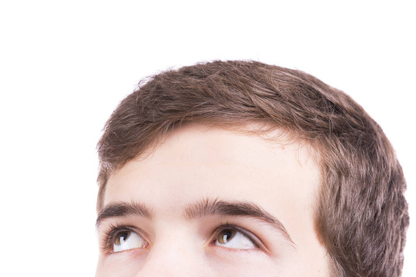 Close up portrait of a boy looking up - Fotó, kép