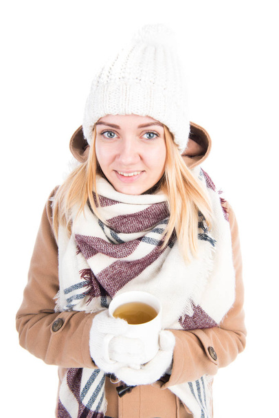 Girl with a cup of tea in the winter - Photo, Image