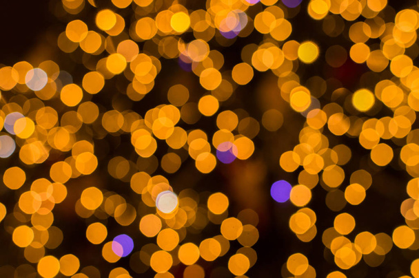 Lampjes op gouden abstracte bokeh voor achtergrond - Foto, afbeelding