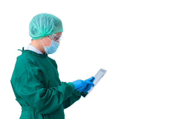 Asian surgeon man working on digital tablet computer - Фото, зображення