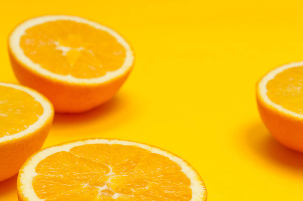 Orange pattern on orange background citrus arrangement - 写真・画像