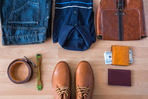 Flat lay of men's casual fashion on white wooden floor - Foto, afbeelding