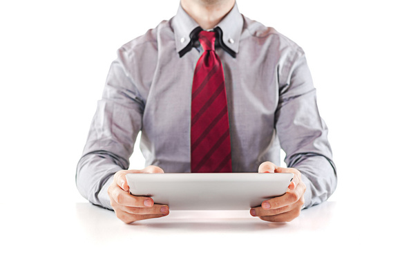 Young business man executive using a digital pc tablet - Fotó, kép