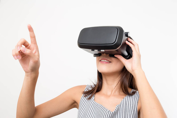 Woman using VR device - Foto, Bild