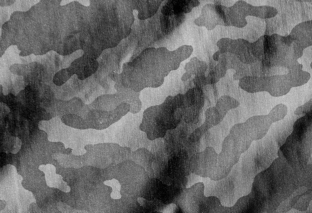 Surface en tissu noir et blanc camouflage
.  - Photo, image