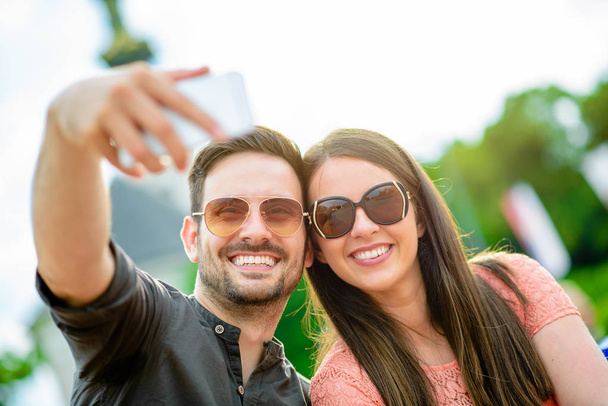 Young couple taking a selfie - Photo, Image