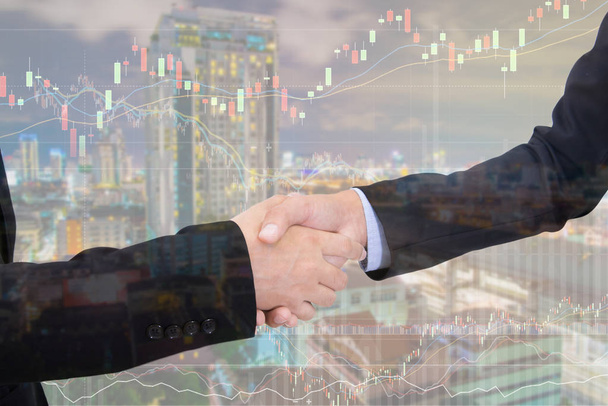 business handshake with city background, Double exposure style - Photo, Image