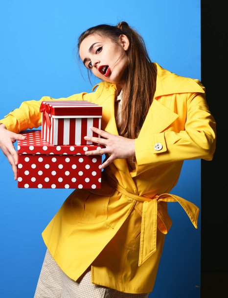 serious colorful girl with present box - 写真・画像