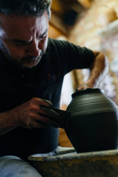 Man making clay pot - Photo, Image
