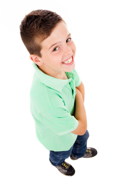 Full body portrait of a happy little boy standing isolated over - Foto, imagen