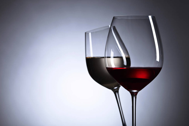 glasses with red and white wine,free space for your text - Foto, imagen