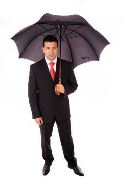 Young business man with umbrella, isolated on white - Foto, Imagem