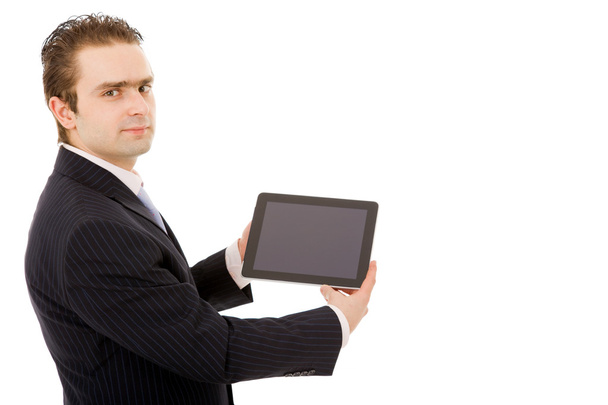 Young business man with tablet pc. Isolated over white background - Valokuva, kuva
