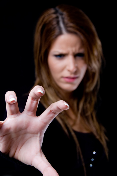 Beautiful female showing hand gesture - Foto, Imagem