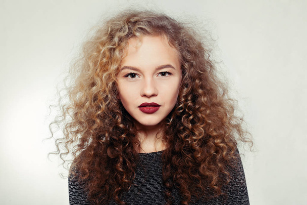 Beauty young woman with curly big and long hair. - Foto, Imagem