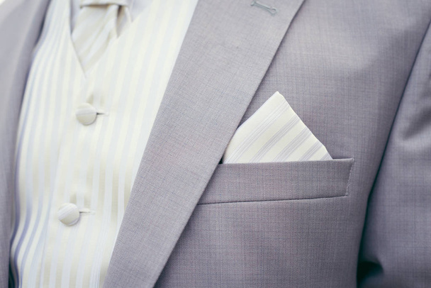 Detail view of groom's wedding suit. - Foto, Imagen