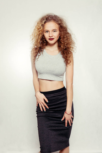 Beauty young woman with curly big and long hair. - Fotoğraf, Görsel
