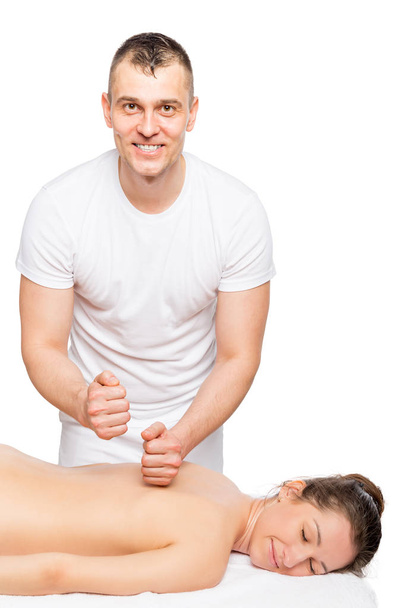 Szczęśliwy, że masaż terapeuta i pacjent się zrelaksować na stole do masażu - Zdjęcie, obraz