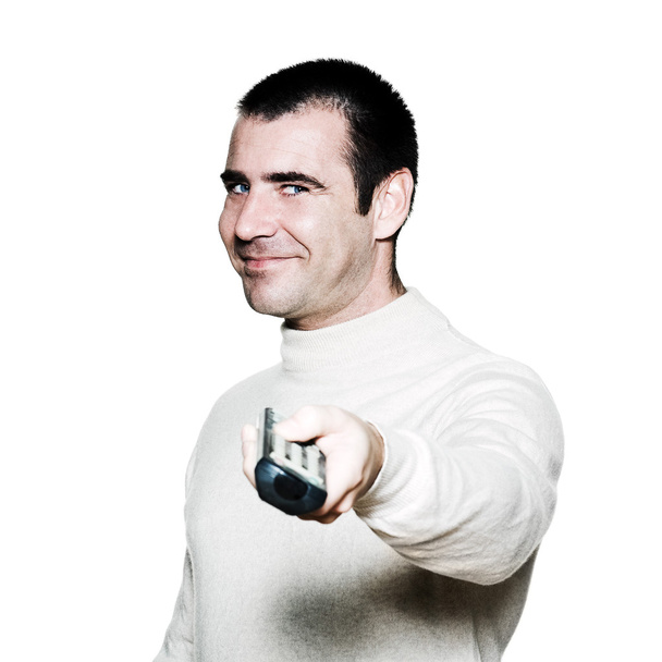 Happy mature man holding remote control - Fotografie, Obrázek