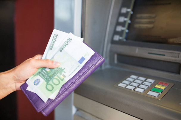 close up of hand withdrawing money at atm machine - Фото, зображення