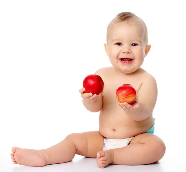 Little child with apple - Фото, зображення