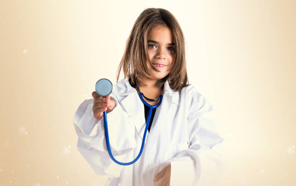 Little girl dressed like a doctor - Foto, Imagen