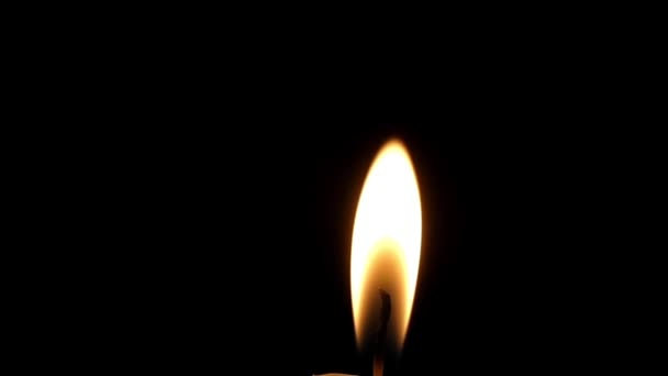 a Lit Candle Flame Playing at Night. - Footage, Video