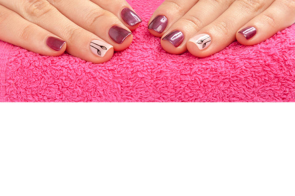 Beautiful female hands with manicure on pink. - Photo, Image