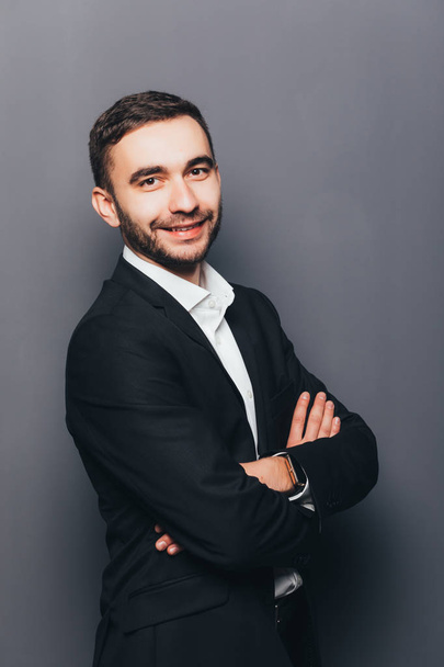 Young businessman in suit side crossed hands   - Fotografie, Obrázek