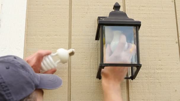 Replace Old Bulb with CFL - Footage, Video