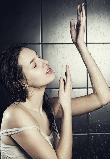young cute curly woman with water - Foto, Imagen
