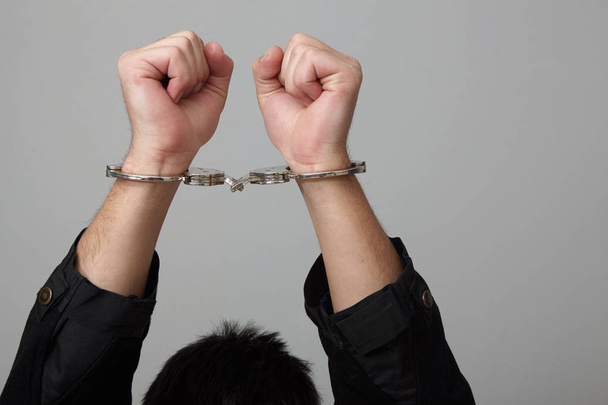 Handcuffed young man. - Photo, image