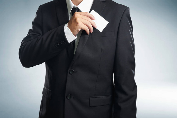 Businessman in black suit - 写真・画像