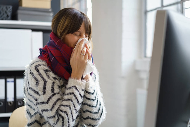 Sick businesswoman with seasonal flu - Fotó, kép