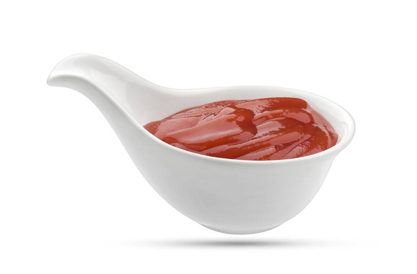 Ketchup in bowl isolated on white - Photo, Image