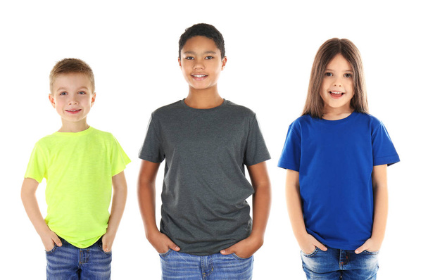 Children wearing different t-shirts on white background - Fotografie, Obrázek
