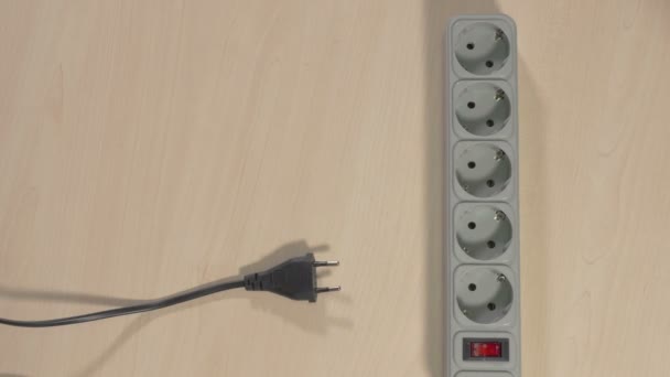 Wires pluged in power strip - Footage, Video
