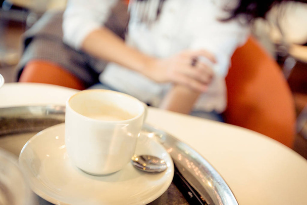 Young Woman Having Coffee In A Cafe - Fotoğraf, Görsel