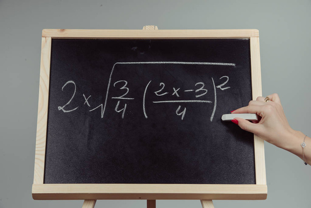 Math exercise on chalkboard - Photo, Image