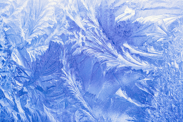 Льодяний візерунок на вікні в зимовий час
 - Фото, зображення