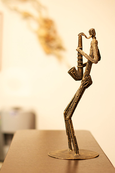 Figurine saxophonist - Zdjęcie, obraz