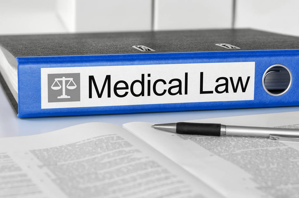 Blaue Mappe mit dem Etikett Medizingesetz - Foto, Bild