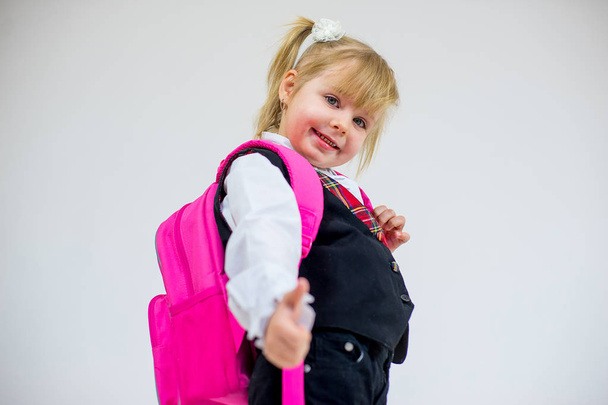portrait of young schoolgirl with schoolbag - 写真・画像