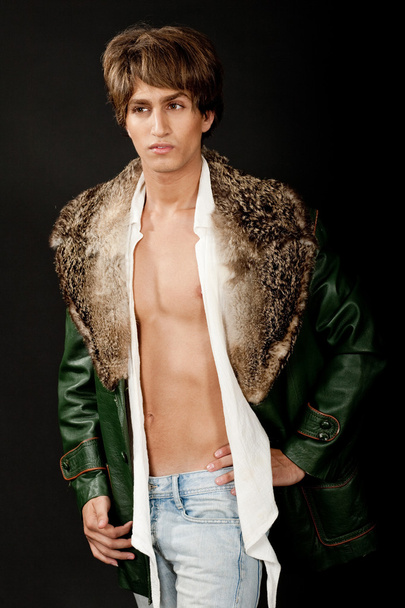 Young guy wearing furry jacket - Foto, immagini